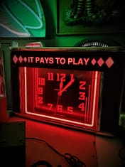 It Pays to Play Vintage Neon Clock