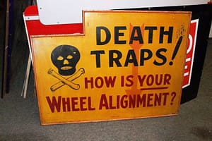 Vintage Signs // bear wheel alignment sign