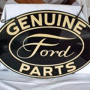 Vintage signs: Antique stores near me hold treasures.. Old Ford tin sign,